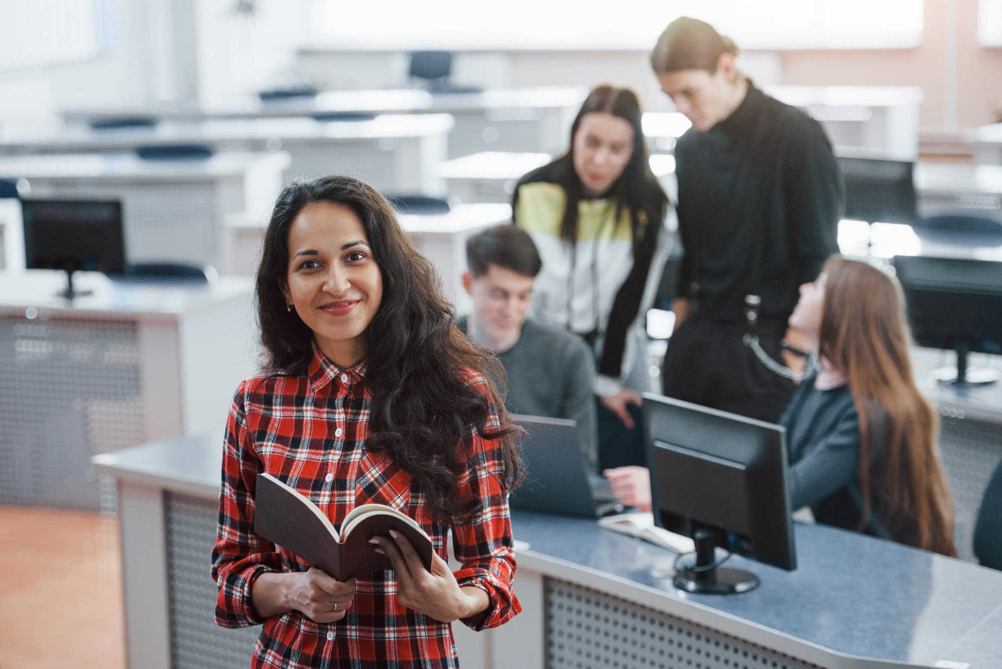 Student studying in a university classroom